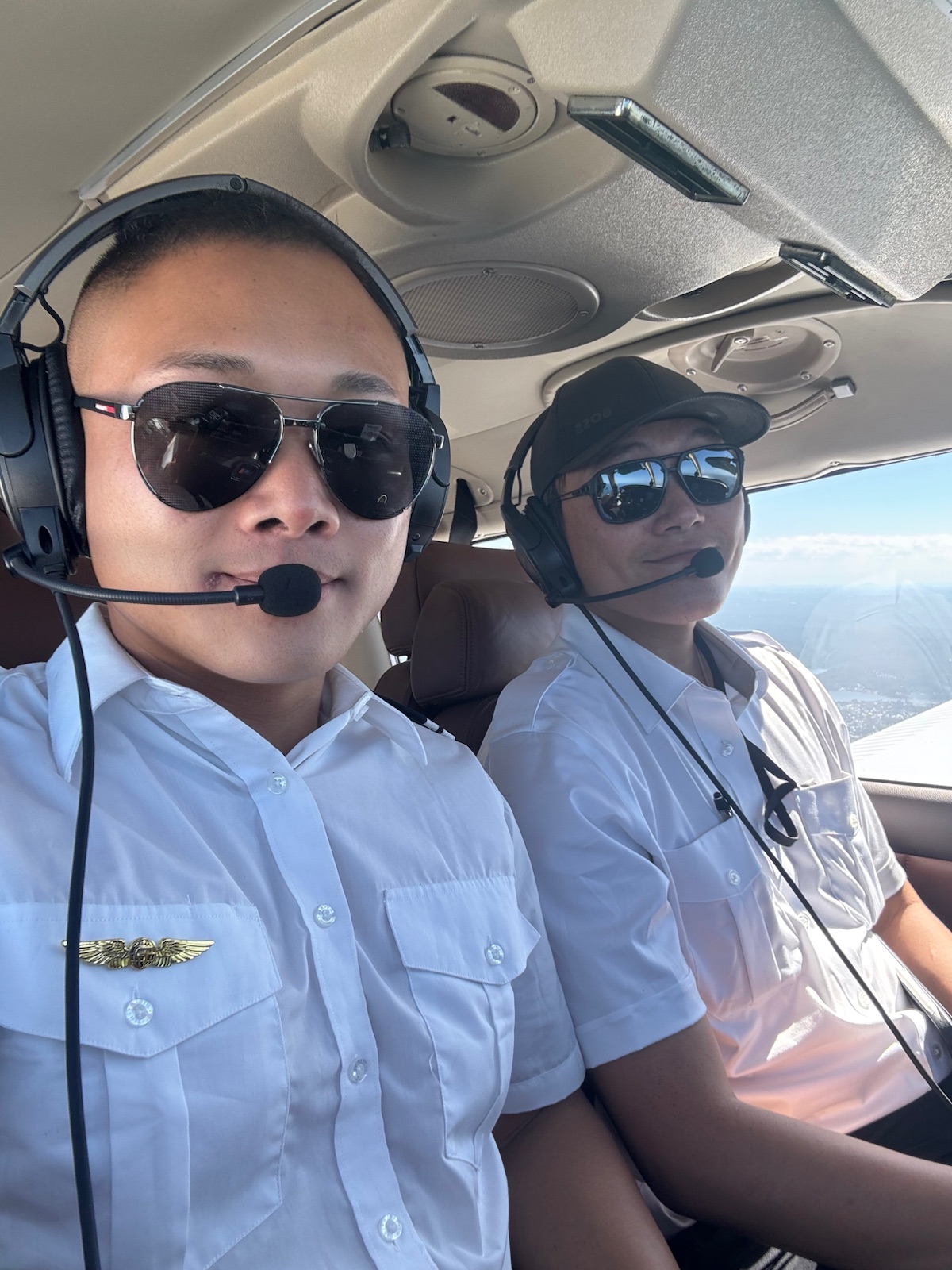 HoneyBee Air pilots in flight wearing headsets